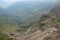 View of the Sani Pass, dirt rural road though the mountains which connects South Africa and Lesotho.