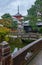 View of Sanju-no-to pagoda over the watercourse with stone bridges at Kiyomizu-dera. Kyoto. Japan