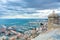 A view from Santa Barbara Castle at the hill in the center of Alicante to a port of the city with a plenty of yachts