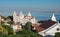 View on Sao Vicente de Fora church and red roofs on Lisbon centre