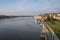 View of Sava river bank in Belgrade. Boats and fishermen can be seen in front and  Kalemegdan fortress on the background.