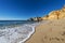 View of the scenic Marinha Beach Praia da Marinha, with seagulls in the sand, in the Algarve region