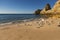 View of the scenic Marinha Beach Praia da Marinha, with seagulls in the sand, in the Algarve region, Portugal