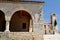 View of the school and the cyprus tree. Vuno. Vlore county. Albania