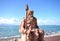 View of the sculpture of Neptune on the beach background Sochi,