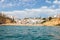 View from the sea of Carvoeiro beach. The Lagoa region has a coastline formed of towering cliffs, turquoise waters and picturesque