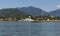 View from the sea of the historic colonial architecture center and the well preserved Atlantic Forest of Paraty, Brazil.