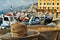 View of the sea port Camogli with boats and fishing tackles