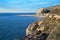 View of the sea and the railway tunnel near the town of El Garraf. Spain.