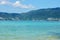 View of the sea, sky and mountains overgrown with jungle Tri Trang Beach in Phuket