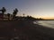 View of the sea and stones on the Pedregalejo Beach at dusk