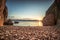 view of the sea in the sunrise, hidden stone beach at Vibnik Krk in Croatia