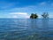 View of the sea from Tae Manu beach, Mamuju you can see trees growing on a small coral island