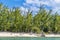 A view from the sea towards the shore of a deserted bay on the island of Eleuthera, Bahamas