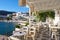 View from the seaside restaurant in picturesque village of Batsi on Andros island, Cyclades