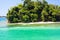 View on secluded islet with white sand and turquoise water - Blue lagoon in Portland, Jamaica