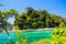 View on secluded islet with white sand and turquoise water - Blue lagoon in Portland, Jamaica