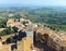 View of a section of beautiful historical town San Gimignano in Tuscany, Italy taken from its tallest tower, Torre Grossa