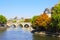 View of the Seine River embankment, the Louvre and bridge, Paris