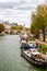 View of Seine river from Pont des arts during Autumn season in the afternoon cloudy day . One of the most important bridge in  the