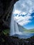 View of Seljalandsfoss Waterfall, tourist popular natural attraction in Iceland