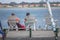 View of a senior couple sitting on a lounger enjoying the view of Aveiro River