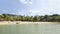 View of Sentosa Palawan Beach. People resting on the shore