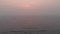 A view of the setting sun and ocean obscurred by Oregon wildfire smoke near Sooke, BC. 4K 24FPS.