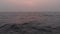 A view of the setting sun and ocean obscurred by Oregon wildfire smoke near Sooke, BC. 4K 24FPS.