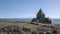 view on Sevanavank Monastery near of Sevan Lake and snowy mountains