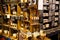 View on shelf made by wooden wine cases inside French shop with typical products. Glass jars with perfumed candles bougies prese