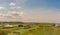 View of Sheringham Golf Course a Steam Train and the sea.