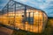 View of a shining greenhouse from side, geothermal heated