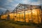 View of a shining greenhouse from side, geothermal heated