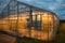 View of a shining greenhouse from side, geothermal heated