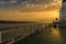 The view from a ship cruising up the Tagus River towards Lisbon at sunrise