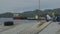 View of ships from a floating village, Moresby