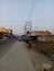 View of shops and traffic on the streets of small towns of India.