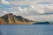 View from the shore of the Krasnoyarsk reservoir in the distance, Mount Tepse