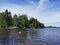 View from the shore of the Ludwigsburg Chapel on Ludwigstein Island in the Monrepos Rock Nature Park of Vyborg against a beautiful