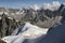 View of silhouettes of mountaineers at the Aiguilles Rouges mountain ranges and Chamonix