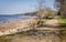 A view of Sillamae beach and bay. The public footpath on Sillamae seafront on a sunny day