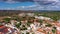 View of Silves town buildings with famous castle and cathedral, Algarve region, Portugal. Walls of medieval castle in Silves town