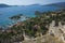 View from Simena castle on tranquil Mediterranean coast landscape in Simena Kalekoy village. Ancient fortress