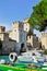 View of sirmione castle on garda lake with boats on sunny day