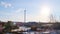 View of site of industrial plant on background of blue sky. Stock footage. Huge truck stands on parking lot at