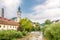 View at the Skofja Loka with Selca Sora river and Saint Jacob church in background - Slovenia