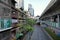 View of skybridge pedestrian walkway leading to Nana BTS Station running above Sukhumvit Road, Bangkok, Thailand