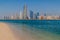 View of the skyline of Abu Dhabi from the Marina Breakwater beach, United Arab Emirat