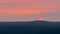 View of the skyline of Berlin, Germany in sunrise seen from lookout platform Wietkiekenberg on the lake Schwielowsee over vast